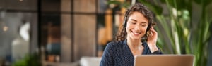 Happy women with a headset on