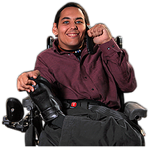 A young adult male with limited mobility smiling.