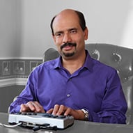 Adult male using TeleBraille services.